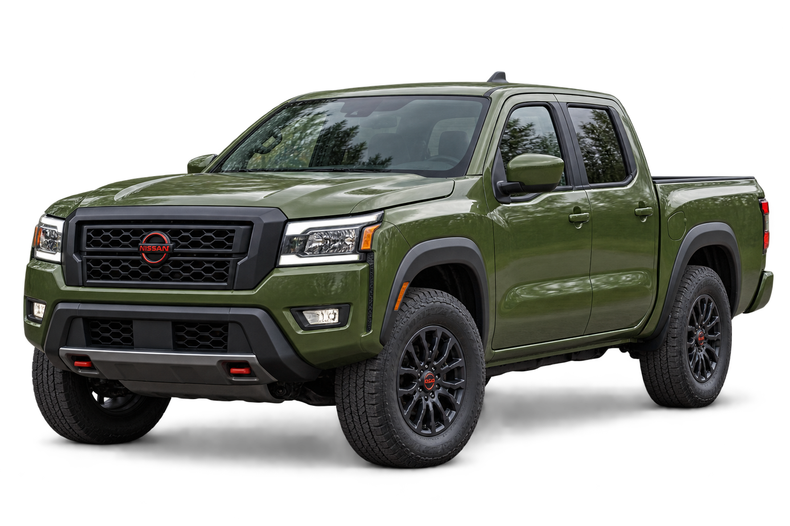 Tactical green 2022 Nissan Frontier approaching in its right-hand lane